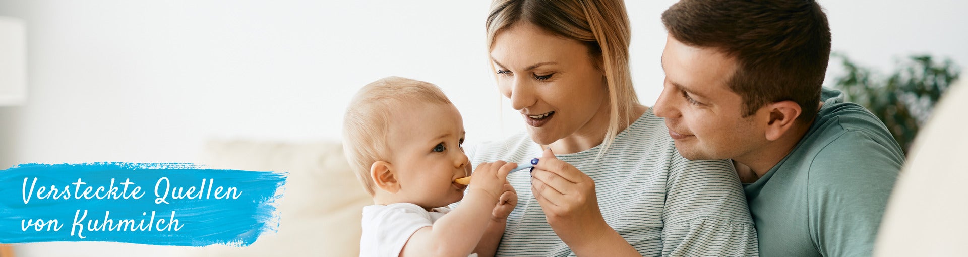 happy parents feeding their kid