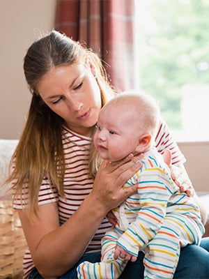 Mother Burping her Baby