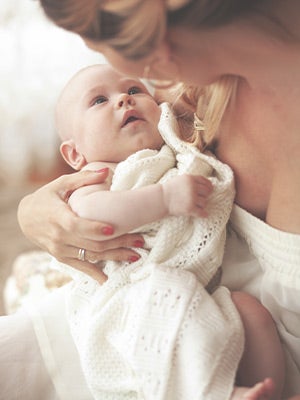 Mother with baby in arms Mother with baby in arms