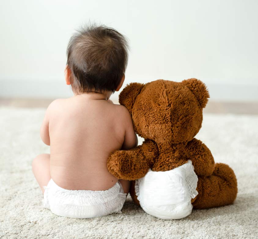 baby with a teddy bear